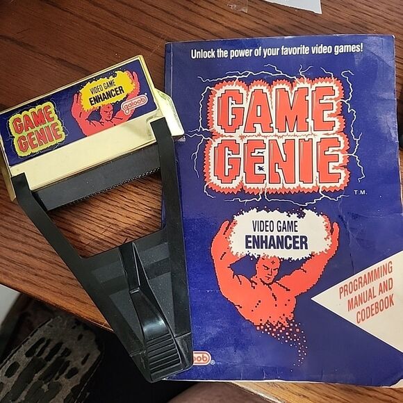 Nintendo NES Game Genie Game Enhancer w/ Manual - Galoob - Picture 1 of 6